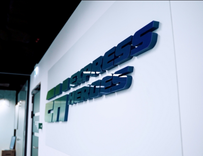 Express Heroes office interior with company logo – international logistics and freight forwarding company in Europe